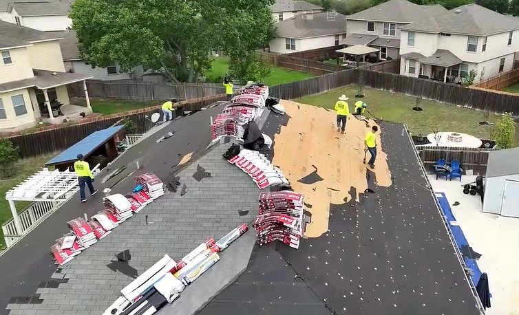 Residential roof being inspected for homebuyer